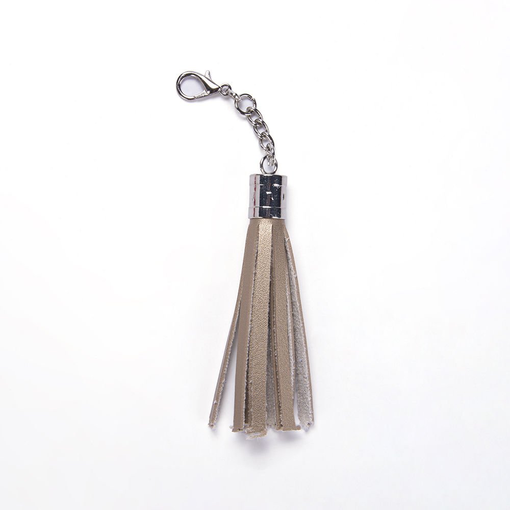 LEATHER BAG TASSEL GOLD