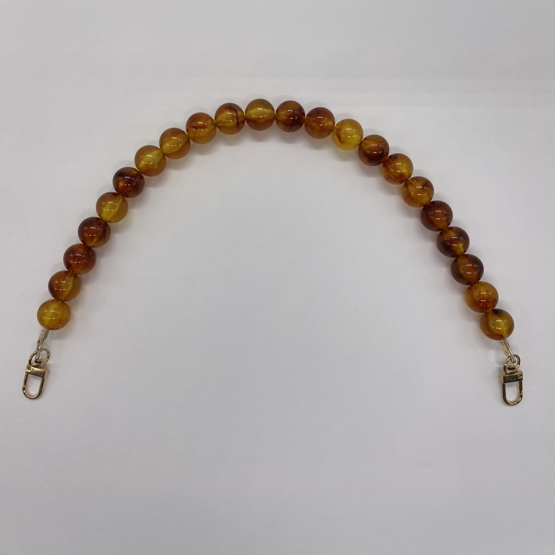 ACRYLIC BEADED BAG HANDLE 45 CM AMBER